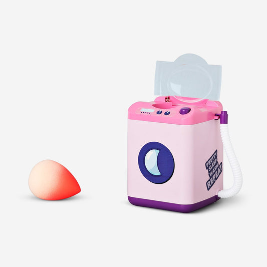 Pink makeup sponge washing machine with a beauty blender