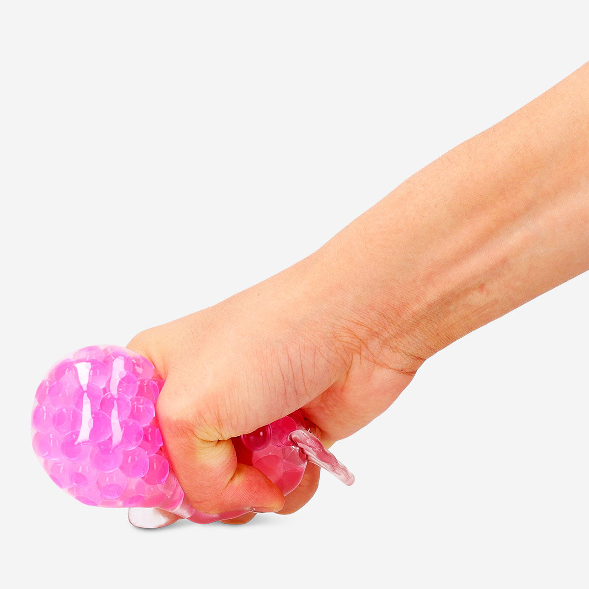 Flying Tiger Copenhagen pink press me toy with hard candy design and cooling effect, a fun gadget for sensory stimulation.
