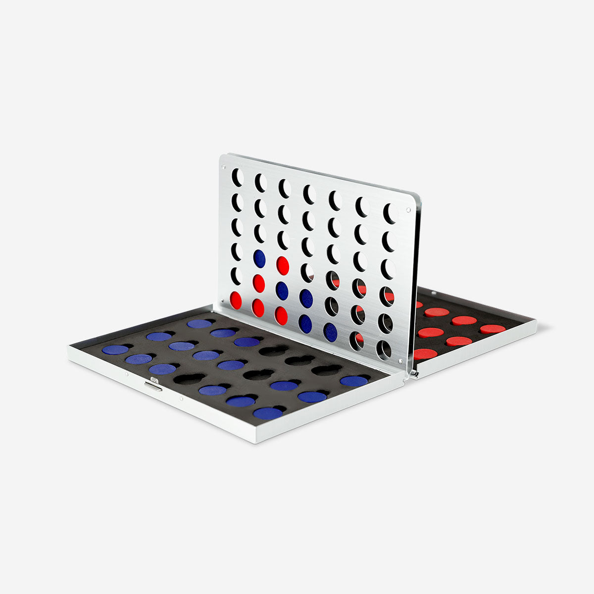 Metal four-in-a-row game by Flying Tiger Copenhagen featuring a black and white grid with red and yellow game pieces.