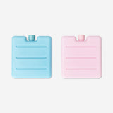 Two colorful blue and pink ice blocks for home use, branded Flying Tiger Copenhagen, shown in the image.
