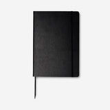 Two black A4 office notebooks with elastic rubber bands from Flying Tiger Copenhagen, showing the closed covers and elastic closures.