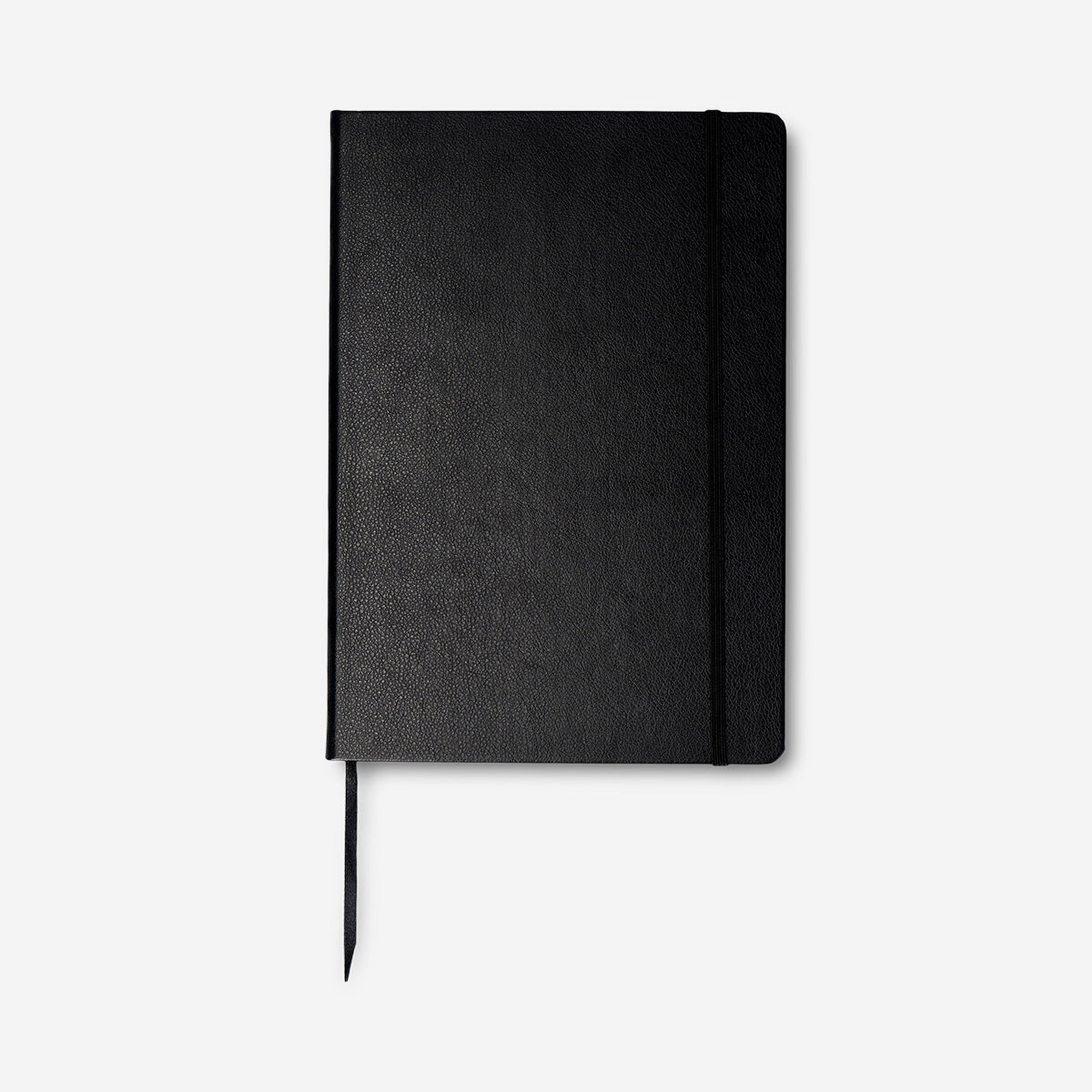 Two black A4 office notebooks with elastic rubber bands from Flying Tiger Copenhagen, showing the closed covers and elastic closures.