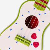 Flying Tiger Copenhagen ukulele with a vibrant dragon fruit design, showcasing a colorful and playful gadget instrument.