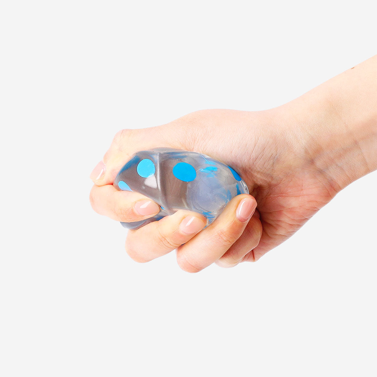 Blue Fidget Dice gadget by Flying Tiger Copenhagen, showing a small, cube-shaped fidget toy with textured sides for stress relief.