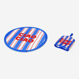 Foldable textile fan with Ciao Ciao print from Flying Tiger Copenhagen, showing its compact, lightweight design.