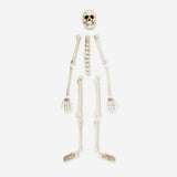Flying Tiger Copenhagen skeleton gadget set featuring small plastic skeleton figures with jointed limbs and detailed bone design.