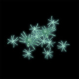 Set of 12 glow-in-the-dark spiders for party decorations, Flying Tiger Copenhagen. Black plastic spiders with luminous features.