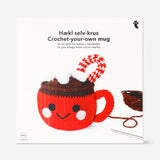 DIY crochet mug with hot chocolate, hobby kit from Flying Tiger Copenhagen featuring a handmade crochet mug and hot chocolate.