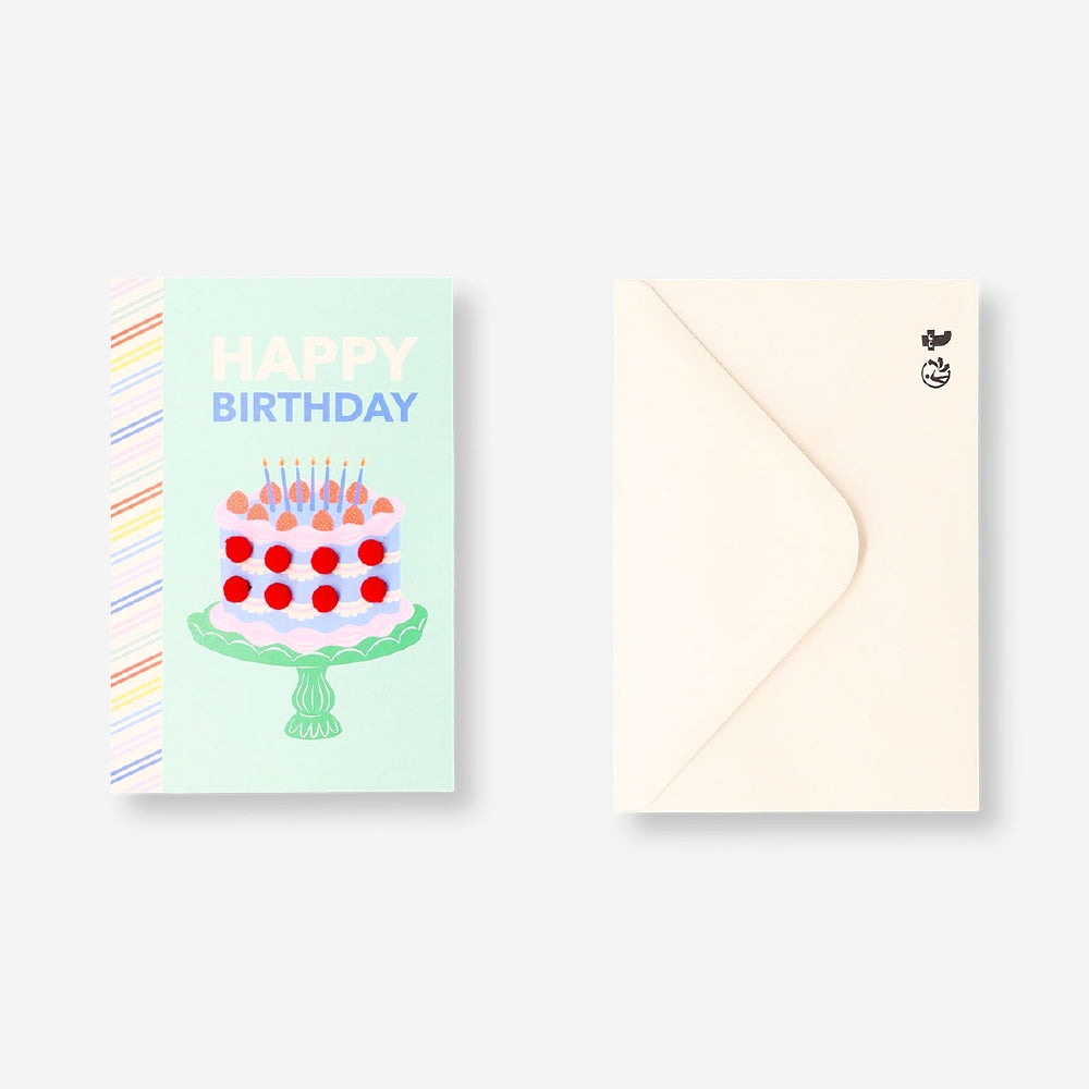 Office birthday card featuring a cake design with colorful pom poms, by Flying Tiger Copenhagen.