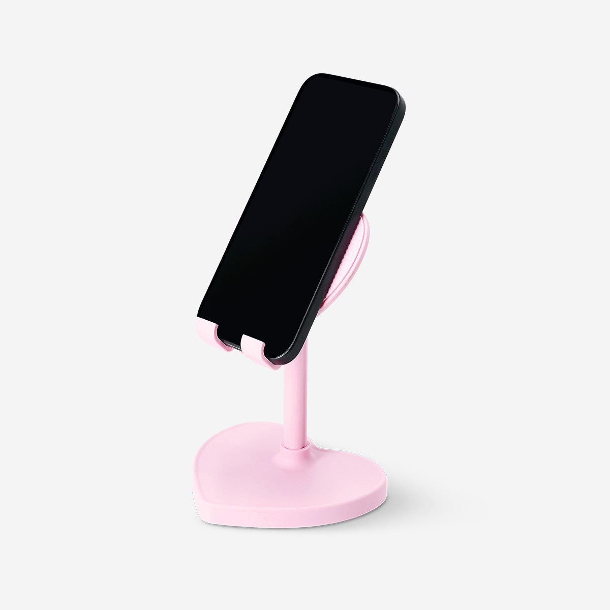 Pink heart-shaped smartphone stand from Flying Tiger Copenhagen, designed for holding media devices with a cute, decorative look.
