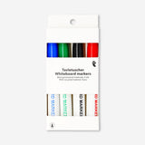 Set of four Flying Tiger Copenhagen whiteboard markers with colorful caps, ideal for office use and easy to write on whiteboards.