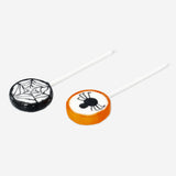 Assorted orange and blackcurrant flavored lollipops in colorful wrappers, from Flying Tiger Copenhagen.