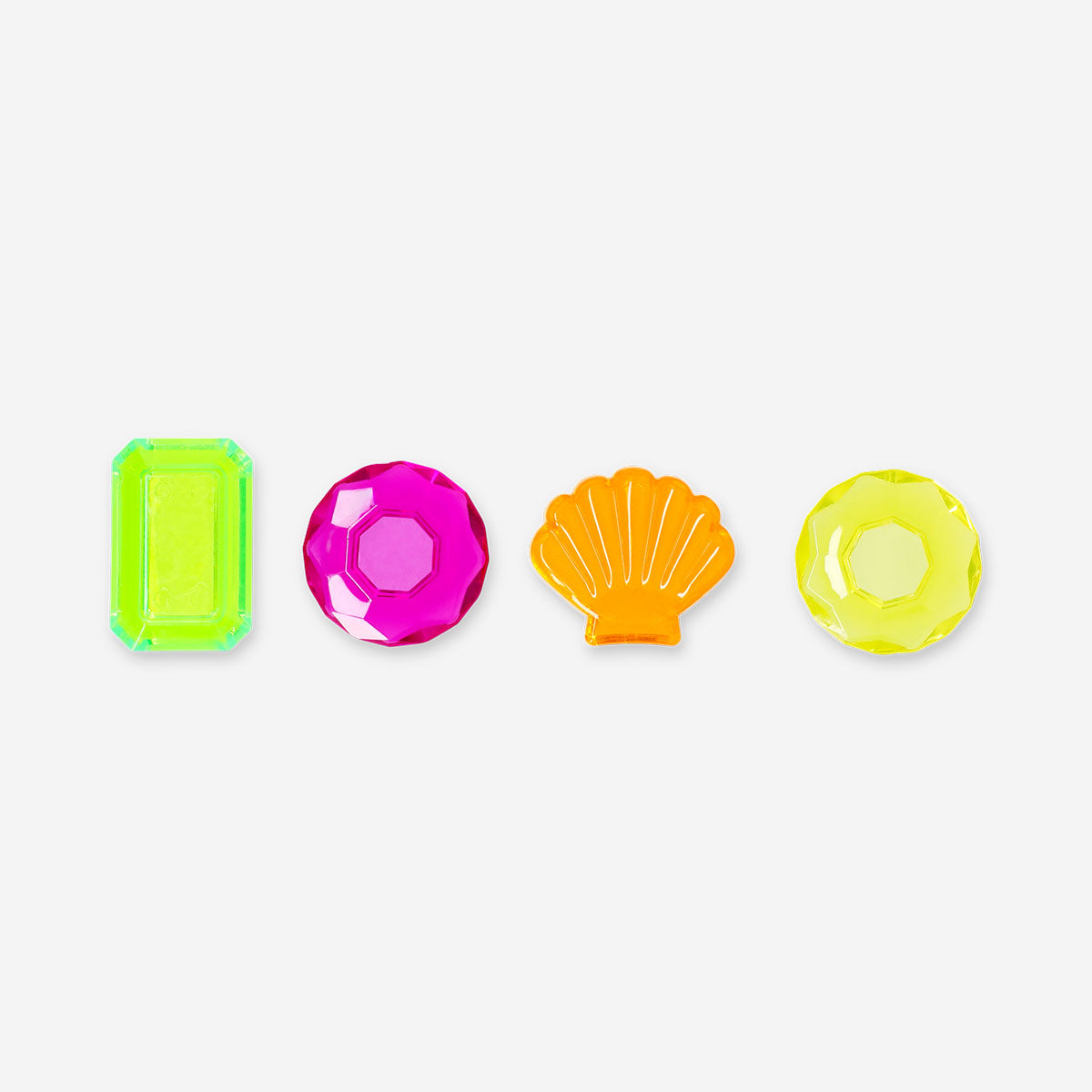 Four colorful diving diamonds toy by Flying Tiger Copenhagen, small plastic floating toys for children.