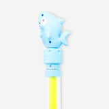 Toy water pump featuring a fun shark decoration from Flying Tiger Copenhagen, perfect for kids' play and water activities.