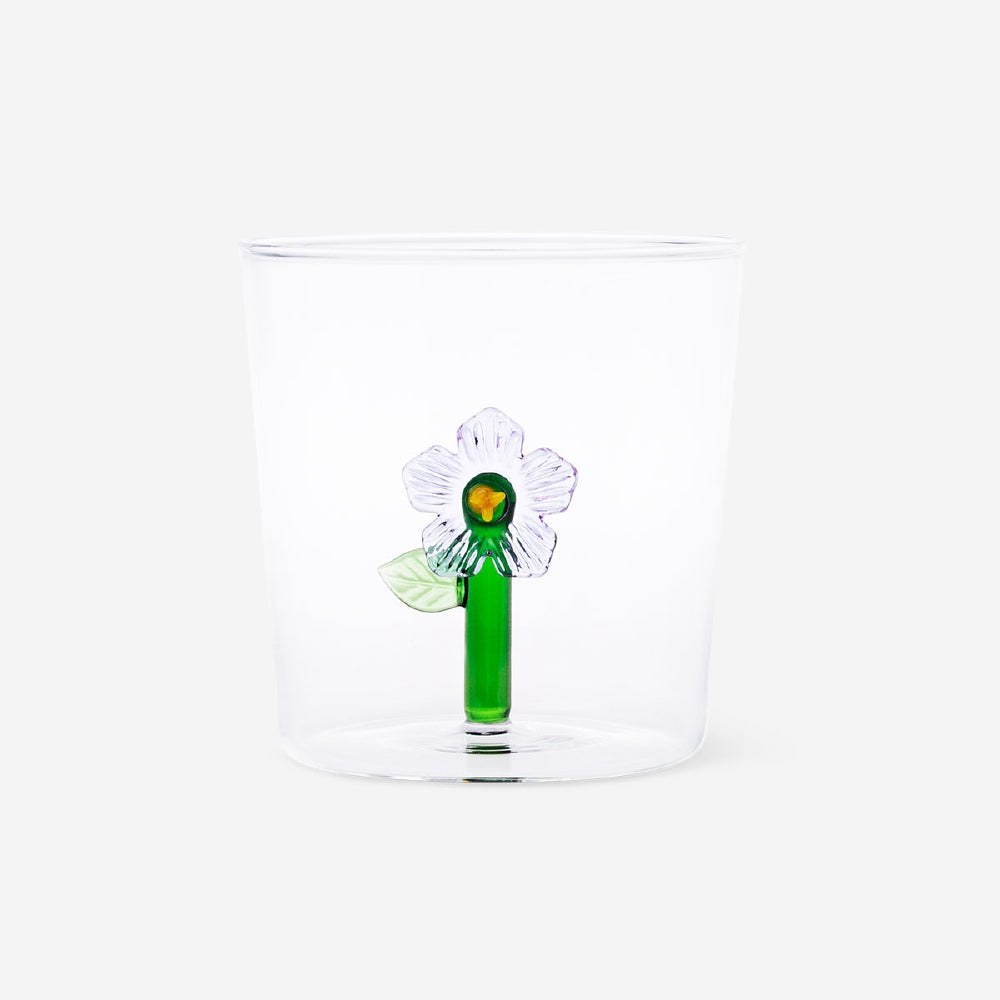 Flying Tiger Copenhagen 350ml glass with a flower inside, showcasing a clear kitchen drinking glass with floral decoration.