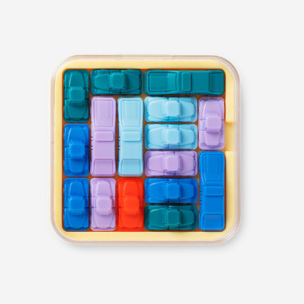 Flying Tiger Copenhagen IQ car puzzle mini game featuring colorful interlocking pieces for brain-teasing fun.