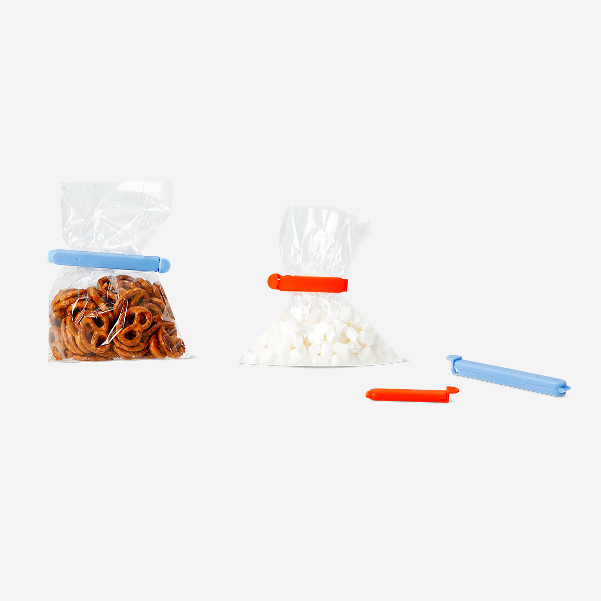 Set of 10 colorful kitchen bag clips by Flying Tiger Copenhagen, made of plastic, for sealing and organizing food bags.