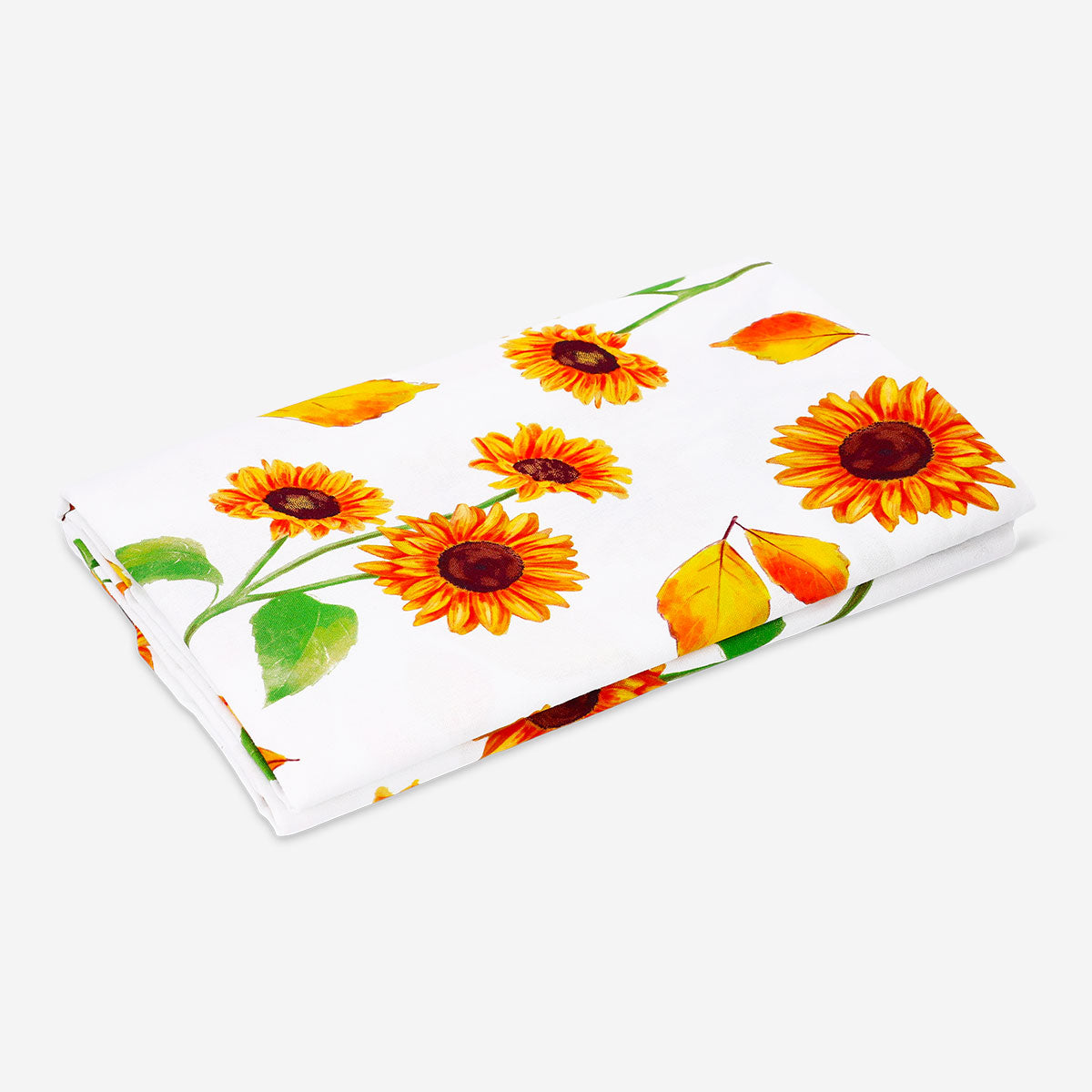 Sunflower print tablecloth on a dining table, 220x140 cm, from Flying Tiger Copenhagen, bright and cheerful home decor accessory.