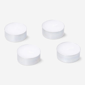 Set of four Flying Tiger Copenhagen scented tealights with forest fragrance, ideal for home ambiance and decoration.