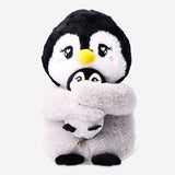 Flying Tiger Copenhagen plush penguin toy with a small nestling, soft and cuddly for children.
