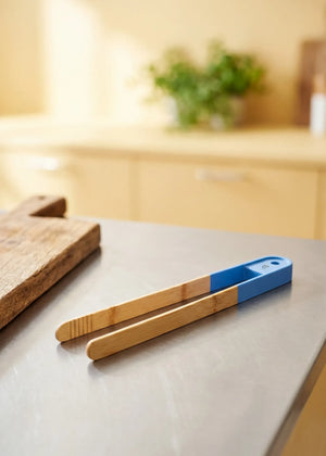 Flying Tiger Copenhagen bamboo kitchen tongs, 30 cm long, designed for handling food with durable, eco-friendly bamboo construction.