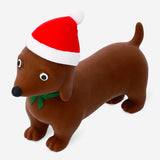 Flying Tiger Copenhagen Press Me toy featuring a festive Christmas sausage dog gadget with a cute, colorful design.