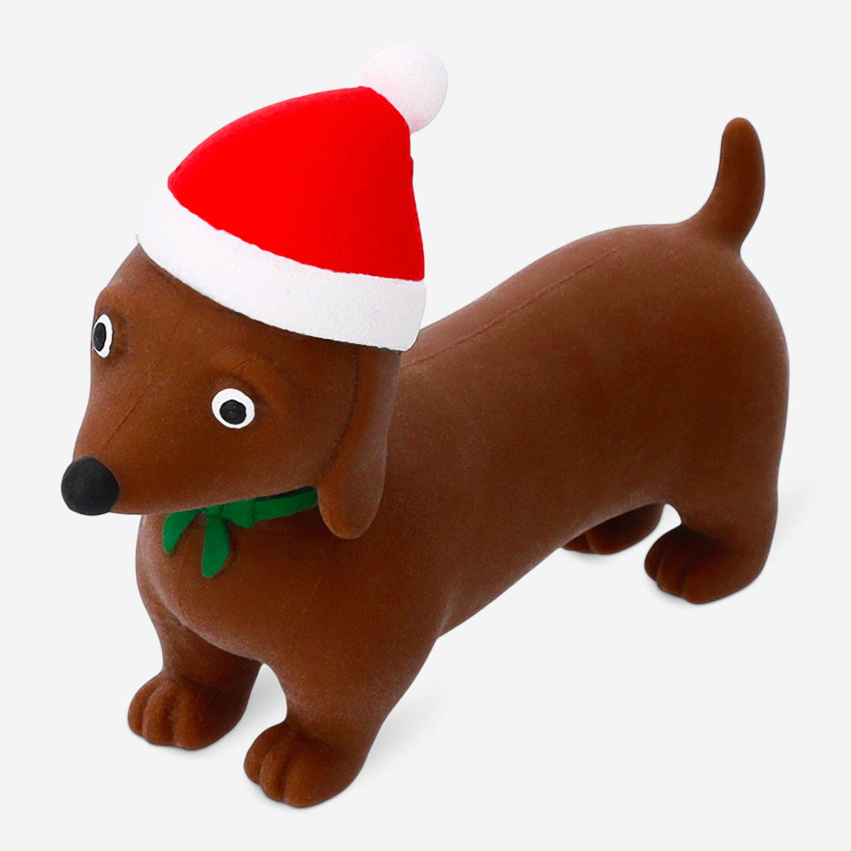 Flying Tiger Copenhagen Press Me toy featuring a festive Christmas sausage dog gadget with a cute, colorful design.