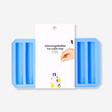 Flying Tiger Copenhagen bottle ice stick tray for making long, cylindrical ice cubes in a kitchen setting.