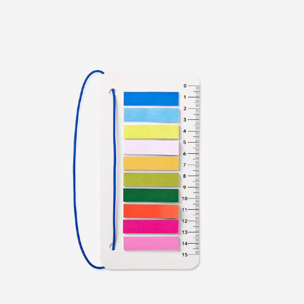 Flying Tiger Copenhagen office ruler with elastic band and page markers, featuring clear measurement markings and a compact design.