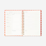Office recipe book by Flying Tiger Copenhagen featuring colorful pages and culinary tips for quick, creative meal ideas.