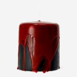 Flying Tiger Copenhagen bleeding pillar candle, 8 cm tall, with a dripping wax design, ideal for home decor and ambient lighting.