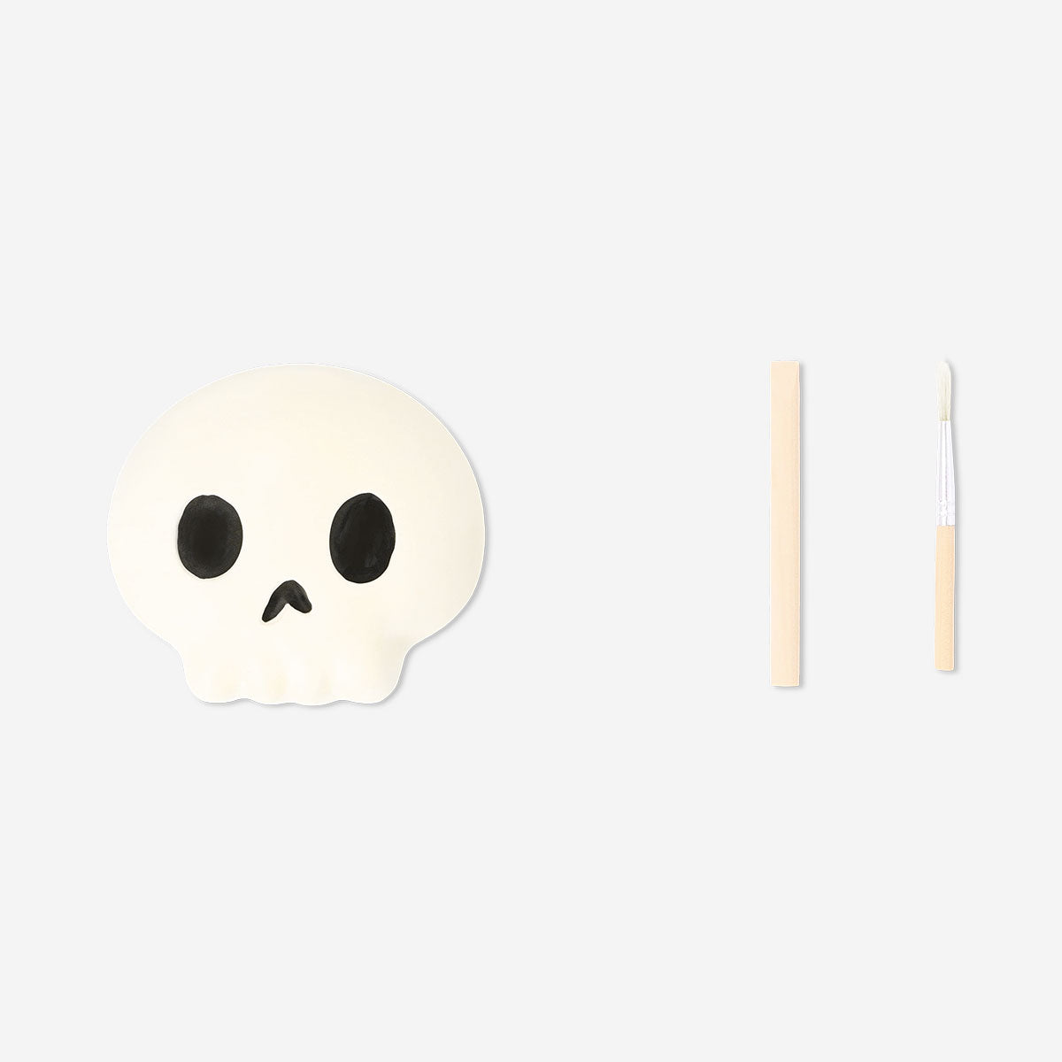 Flying Tiger Copenhagen excavation kit featuring a skull toy for digging and discovery activities.