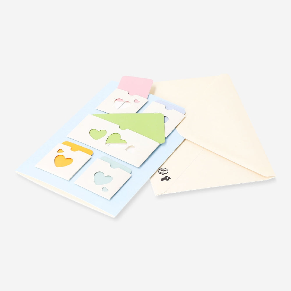 Flying Tiger Copenhagen greeting card with small envelopes decorated with hearts, ideal for office or personal messages.