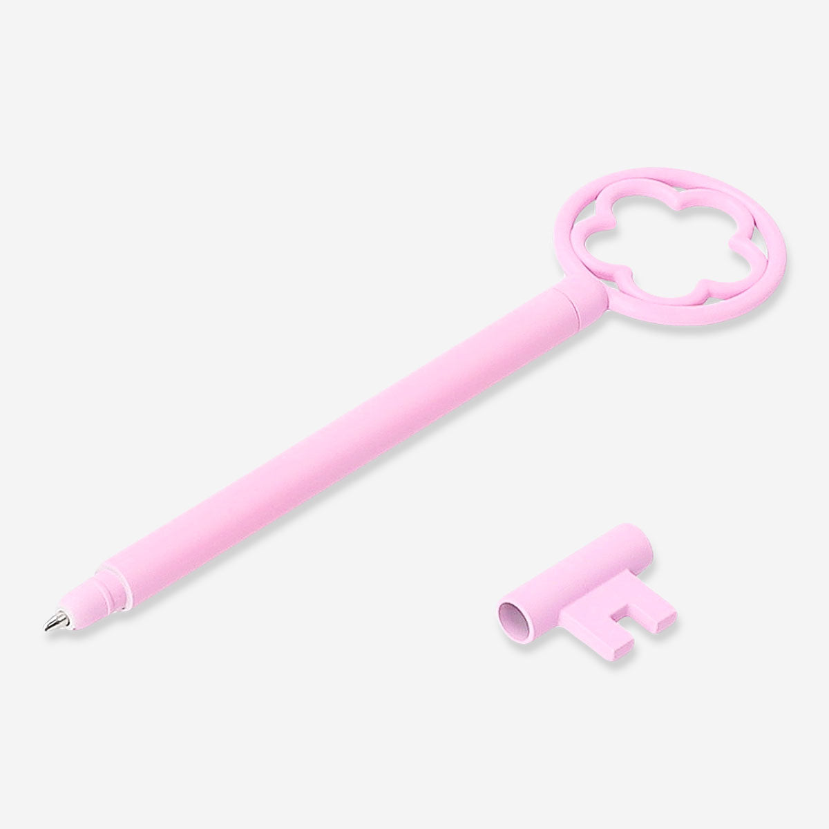 Pink key-shaped ballpoint pen from Flying Tiger Copenhagen, designed for office use, with a sleek, colorful key shape.
