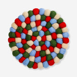Colorful wool trivet in mixed colors, 19 cm, designed for kitchen use, by Flying Tiger Copenhagen.