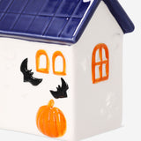 Decorative ceramic Halloween house by Flying Tiger Copenhagen, 13 cm tall, with spooky design perfect for seasonal home decor.