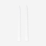 Set of four white twisted dinner candles for home decor, crafted by Flying Tiger Copenhagen.