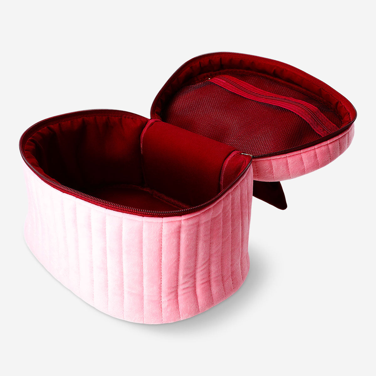 Pink velvet cosmetic bag with bow from Flying Tiger Copenhagen, stylish personal care pouch with soft fabric and decorative bow detail.