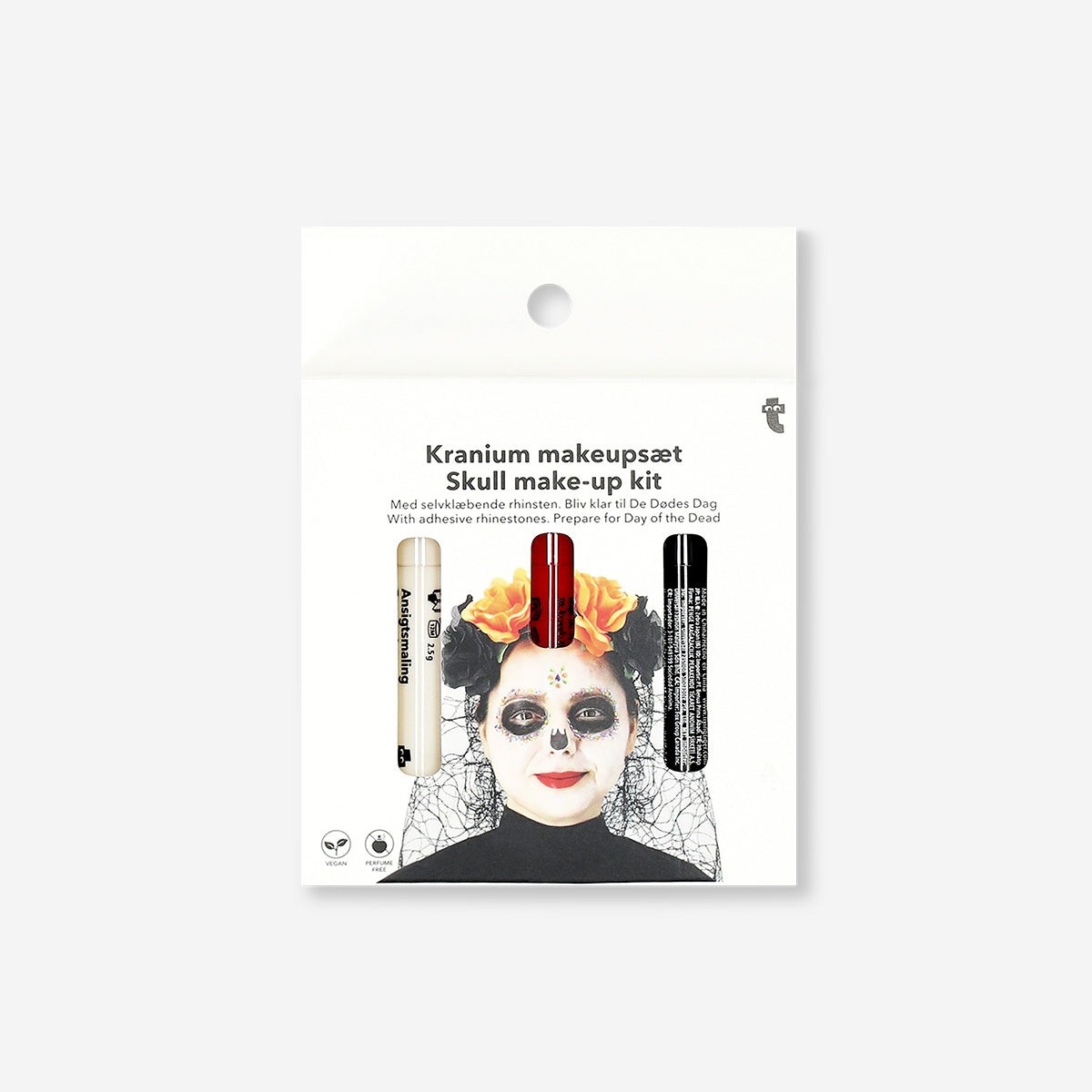 Skull makeup kit with adhesive rhinestones from Flying Tiger Copenhagen, featuring face paint and decorative rhinestones for costume looks.