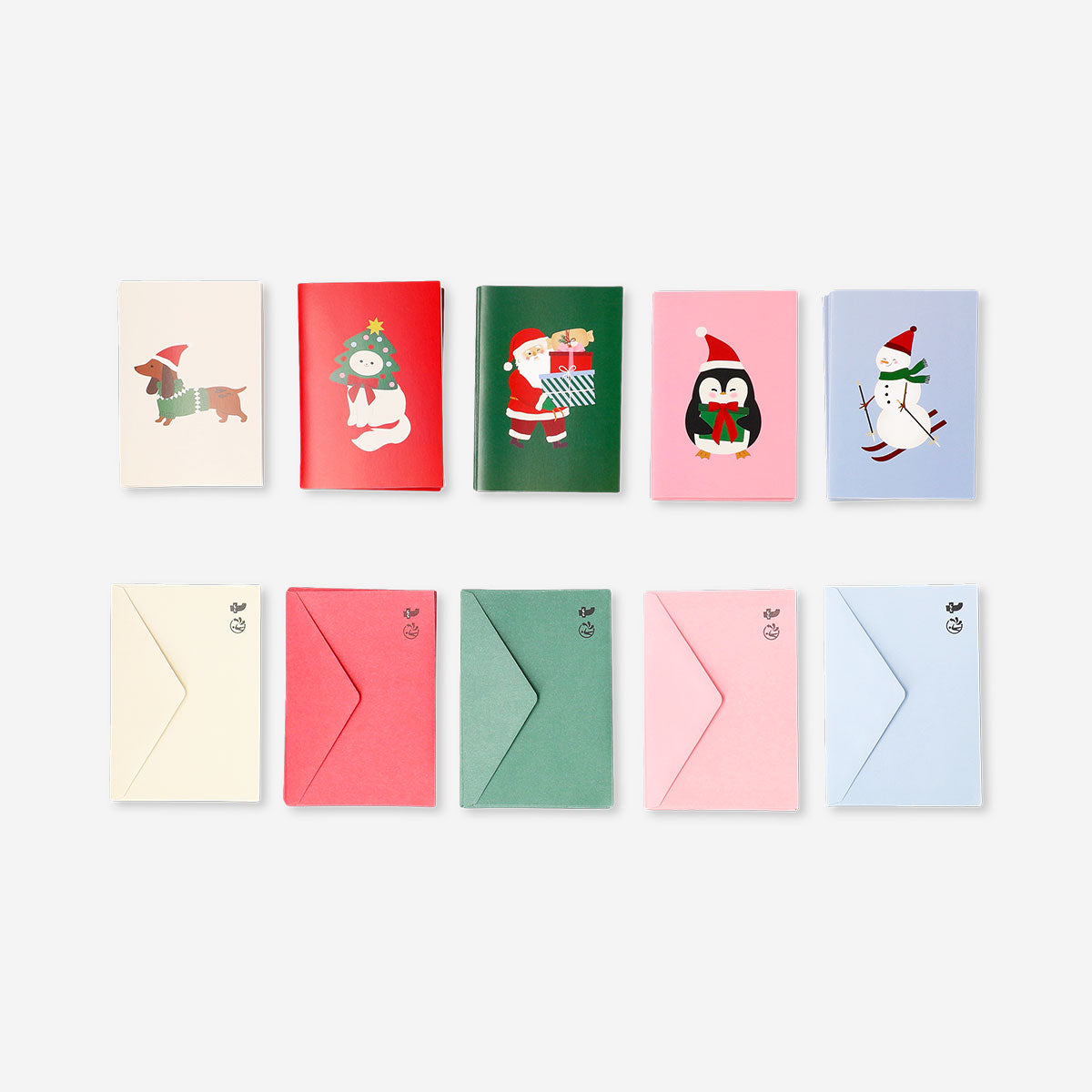 Set of 15 Flying Tiger Copenhagen Christmas greetings cards with festive office-themed designs, arranged on a white background.