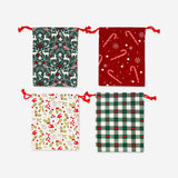 Set of four Flying Tiger Copenhagen Christmas print drawstring gift bags, ideal for office gift wrapping, featuring festive holiday designs.