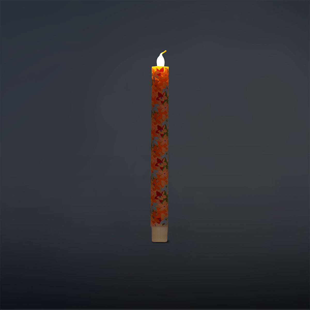 Flying Tiger Copenhagen LED dinner candle with floral print, 24 cm tall, designed for home decor and ambient lighting.