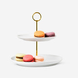 Flying Tiger Copenhagen two-tier kitchen cake stand with metal frame and glass plates, ideal for serving desserts or snacks.