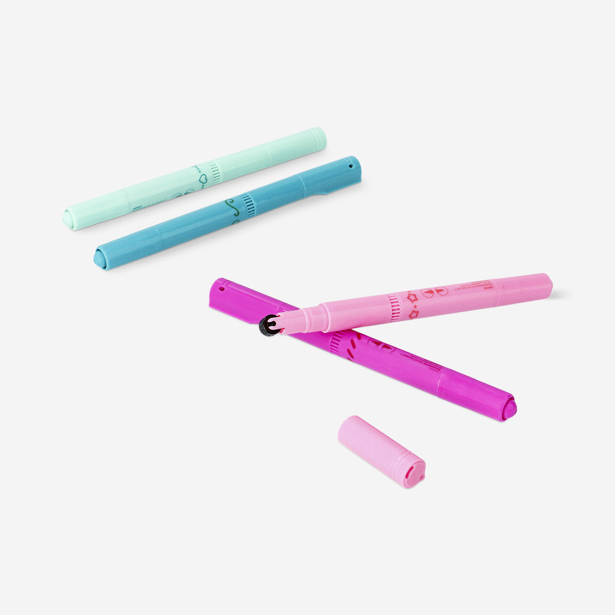 Set of four Flying Tiger Copenhagen dual tip markers with stamps, ideal for office and craft projects, featuring colorful ink and versatile tips.