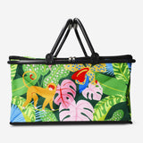 Flying Tiger Copenhagen cooler bag with tropical print, 45x26 cm, ideal for keeping food and drinks cool during outings.