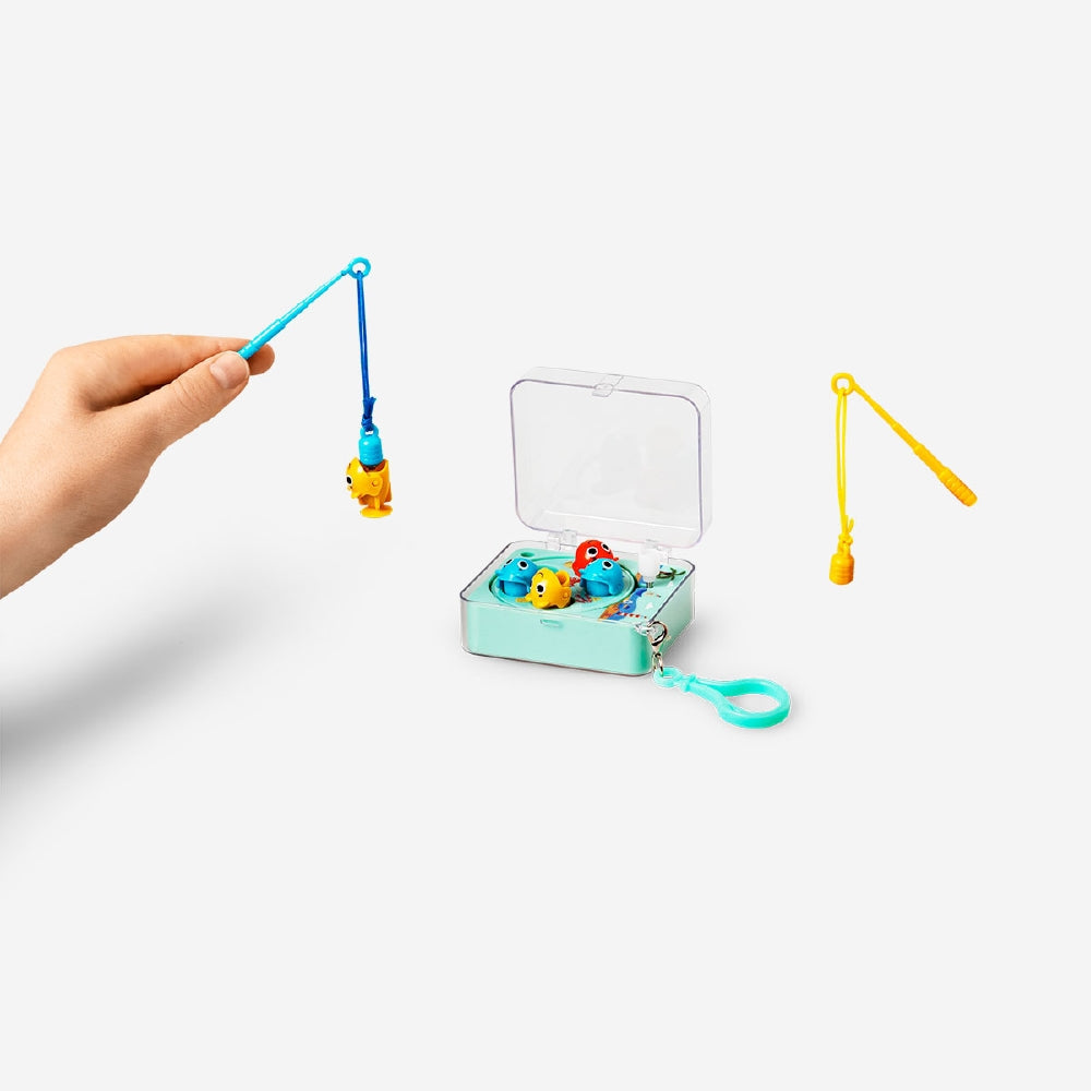 Flying Tiger Copenhagen mini fishing game featuring colorful plastic fishing poles and small fish targets for kids' fun.