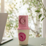 Flying Tiger Copenhagen desktop fan shaped like a coffee cup, compact gadget with a small fan and detailed coffee cup design.