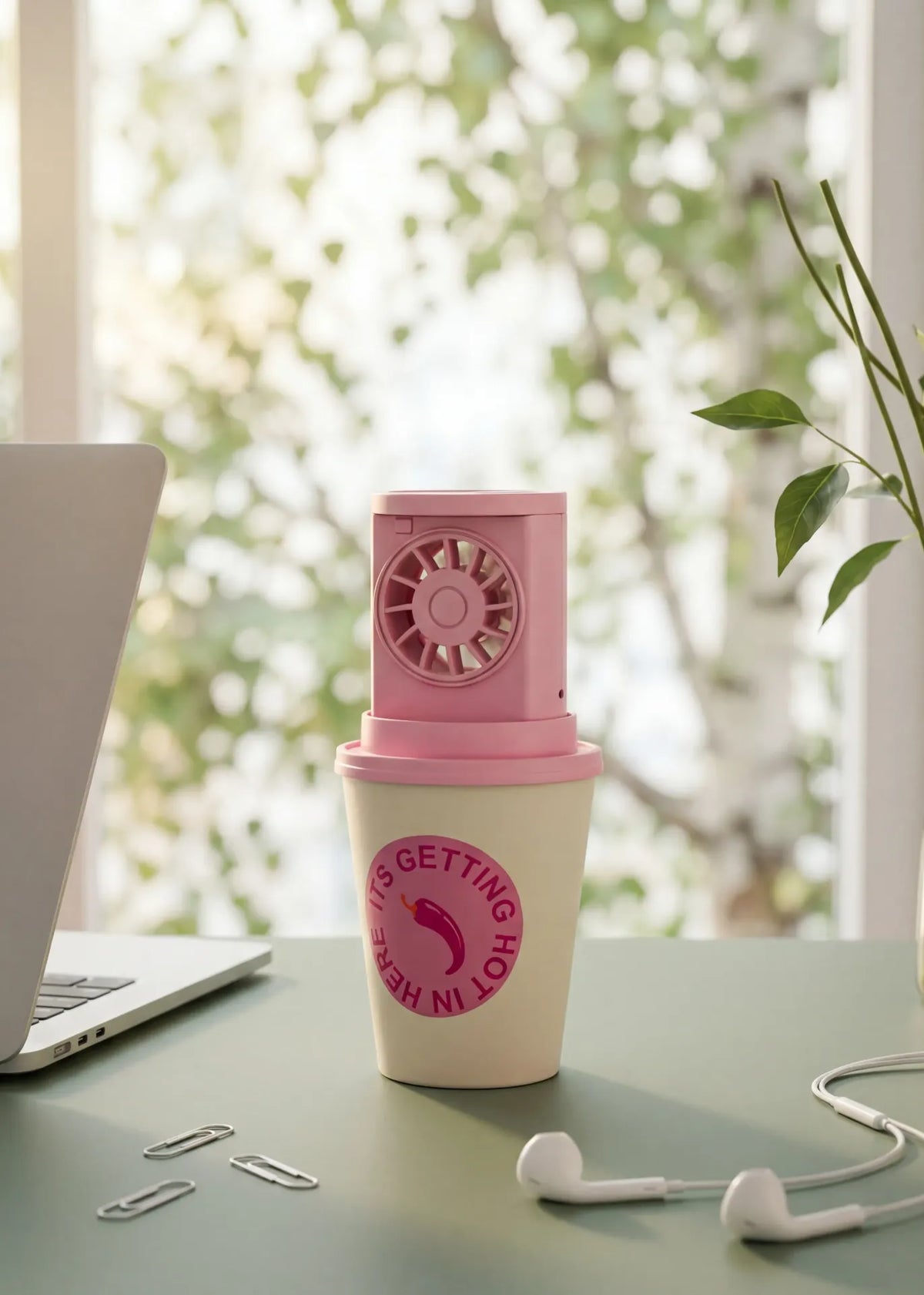 Flying Tiger Copenhagen desktop fan shaped like a coffee cup, compact gadget with a small fan and detailed coffee cup design.