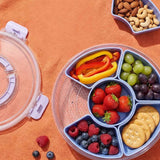 Blue rotating snack box with lid, kitchen storage container by Flying Tiger Copenhagen, designed for organizing snacks.