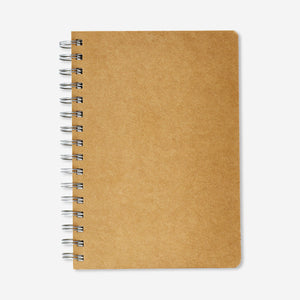 A5 office notebook with colorful tabs and craft paper cover by Flying Tiger Copenhagen, open to show lined pages.